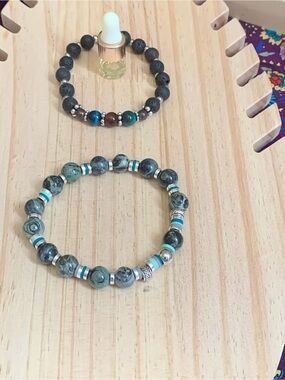 two gemstone bracelets w/essential oils